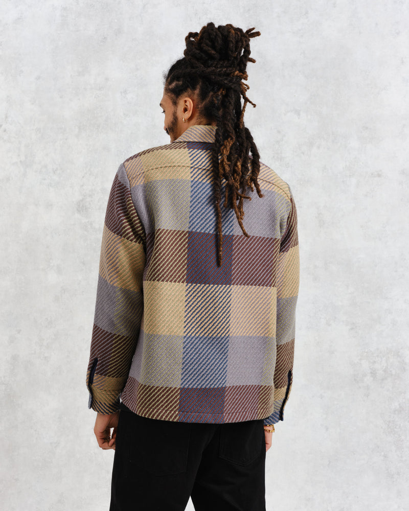 model facing back wearing multi colour square check overshirt